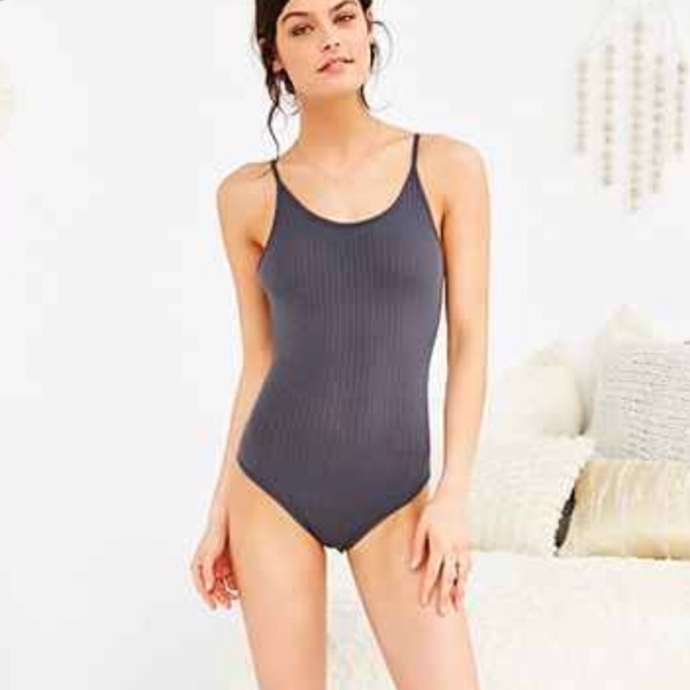 Our from under rubber body suit